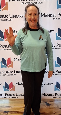 Sherry R cosplay in diy Star Trek TOS science teal blue shirt